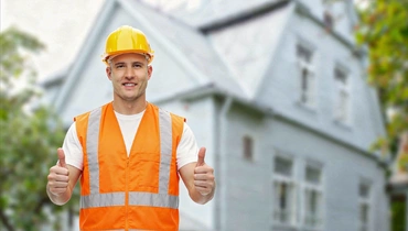 happy homeowner satisfied with completed remodeling project in los angeles Premier Contractor LA